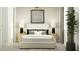 Serene bedroom with neutral tones, modern lighting, and stylish decor, creating a comfortable and inviting retreat at 3122 S 156Th Ave, Goodyear, AZ 85338