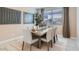 Elegant dining room with a large table and neutral decor at 3123 S 155Th Ln, Goodyear, AZ 85338