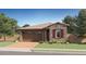 Charming single-Gathering home with brick driveway, two-car garage and beautiful stone accents at 3123 S 155Th Ln, Goodyear, AZ 85338