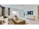 Open living room with recessed lighting and sliding glass doors to the backyard at 3123 S 155Th Ln, Goodyear, AZ 85338