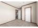 Neutral bedroom with carpet and doorways leading to other areas of the home at 32650 N 223Rd Dr, Wittmann, AZ 85361