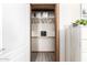 Organized walk-in closet with shelving and hanging space, offering ample storage at 32650 N 223Rd Dr, Wittmann, AZ 85361