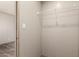 Closet boasts a wire shelf and wood-look flooring, enhancing its overall functionality at 32712 N 223Rd Dr, Wittmann, AZ 85361