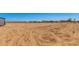 Spacious lot ready for your dream home or development, with mountain views and clear skies at 32712 N 223Rd Dr, Wittmann, AZ 85361