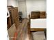 Bedroom with hardwood floors, wood furniture, and white walls at 3330 E Main St # 448, Mesa, AZ 85213