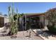 Relaxing outdoor space with covered patio and decorative cactus accents at 3330 E Main St # 448, Mesa, AZ 85213