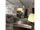 View of the living room and office space with comfortable seating at 3330 E Main St # 448, Mesa, AZ 85213