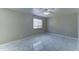 Bright bedroom featuring stylish tile flooring, a ceiling fan, and a window for natural light at 42 S Vineyard --, Mesa, AZ 85210
