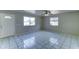 Living room featuring tiled flooring and lots of natural light at 42 S Vineyard --, Mesa, AZ 85210