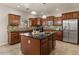 Gourmet kitchen featuring granite countertops, stainless steel appliances and a center island at 5060 S Clancy --, Mesa, AZ 85212