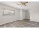 This bedroom features hard wood flooring and a ceiling fan, perfect for comfort and style at 6625 N 44Th Ave, Glendale, AZ 85301