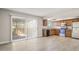 Bright kitchen features wood cabinets, stainless steel appliances, and sliding glass door at 6625 N 44Th Ave, Glendale, AZ 85301