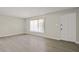 Bright living room with neutral walls, and a large window for natural light at 6625 N 44Th Ave, Glendale, AZ 85301