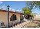Charming single-story home featuring stucco accents, desert landscaping, and a covered entry on a sunny day at 6739 N 16Th St # 17, Phoenix, AZ 85016