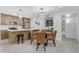Dining area adjacent to the kitchen with stylish lighting and comfortable seating for four at 7777 E Main St # 215, Scottsdale, AZ 85251
