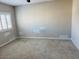 Bedroom featuring carpeted floors and a bright window at 8330 N 22Nd Ln, Phoenix, AZ 85021