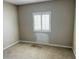 Bedroom featuring carpeted floors and a bright window at 8330 N 22Nd Ln, Phoenix, AZ 85021