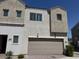 Charming two-story townhome with a two-car garage and well-maintained landscaping at 8330 N 22Nd Ln, Phoenix, AZ 85021