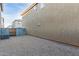 Exterior shot of the backyard with gravel and a fence at 840 E Agua Fria Ln, Avondale, AZ 85323