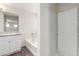 Bathroom with vanity, bathtub, and shower featuring modern fixtures at 840 E Agua Fria Ln, Avondale, AZ 85323