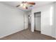 Bedroom includes fan, carpet, entrance and closet at 840 E Agua Fria Ln, Avondale, AZ 85323