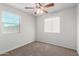Bedroom featuring window for light and ceiling fan for cooling at 840 E Agua Fria Ln, Avondale, AZ 85323