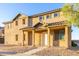 A cozy home with an appealing front porch, perfect for enjoying the outdoors at 840 E Agua Fria Ln, Avondale, AZ 85323