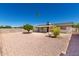 Spacious backyard with desert landscaping, providing a low-maintenance outdoor area at 915 E Commonwealth Pl, Chandler, AZ 85225