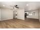 Inviting living room featuring ceiling fan, recessed lighting, and open concept design at 915 E Commonwealth Pl, Chandler, AZ 85225