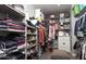 Organized walk-in closet with shelving and drawers providing ample storage space for clothes and shoes at 943 E Kortsen Rd # 10, Casa Grande, AZ 85122