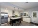 Beautiful, modern kitchen with a marble island, stainless steel appliances and ample cabinet space at 943 E Kortsen Rd # 10, Casa Grande, AZ 85122