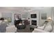 Cozy living room features a fireplace, neutral décor, and ample natural light at 943 E Kortsen Rd # 10, Casa Grande, AZ 85122