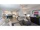 Bright open living space connecting the kitchen to the comfortable living room with ample natural light at 943 E Kortsen Rd # 10, Casa Grande, AZ 85122
