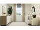 Charming Bedroom with a crib, dresser, and soft lighting, perfect for a baby's room at 9830 W Pinchot Ave, Phoenix, AZ 85037