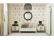 Cozy Bedroom with a crib, side tables, and cute wallpaper at 9830 W Pinchot Ave, Phoenix, AZ 85037