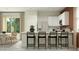 Bright and airy kitchen with a breakfast bar and ample counter space at 9830 W Pinchot Ave, Phoenix, AZ 85037