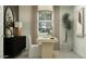 Comfortable home office featuring a desk, chair, and natural lighting at 9830 W Pinchot Ave, Phoenix, AZ 85037