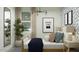 A bedroom featuring natural light, chic lighting fixture, and modern wall art at 9839 W Pinchot Ave, Phoenix, AZ 85037