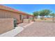 The private backyard is xeriscaped and provides privacy at 103 S Birdie Way, Casa Grande, AZ 85194