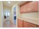 Bright hallway with built in cabinet space and access to bedrooms at 103 S Birdie Way, Casa Grande, AZ 85194