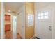 Bright hallway with built in cabinet space and access to other rooms at 103 S Birdie Way, Casa Grande, AZ 85194