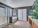 Bathroom featuring walk-in shower, bathtub, and dual sinks in a wood vanity at 10501 W Wilshire Dr, Avondale, AZ 85392
