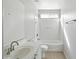 Well-lit bathroom features a shower-tub combo and a vanity with a sink at 118 N 223Rd Ave, Buckeye, AZ 85326