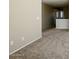 Neutral bedroom with carpeted floors at 118 N 223Rd Ave, Buckeye, AZ 85326