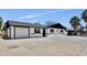 Charming single-story home with updated front exterior paint and spacious driveway at 132 W Orchid Ln, Chandler, AZ 85225