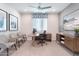 Inviting home office with a modern desk, comfortable seating, and ample natural light at 17187 W Corrine Dr, Surprise, AZ 85388
