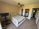 Cozy bedroom with a ceiling fan, comfortable carpet, and a large mirror at 1825 W Ray Rd # 2082, Chandler, AZ 85224
