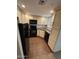 Kitchen featuring granite countertops, stainless steel appliances, and hardwood floors at 1825 W Ray Rd # 2082, Chandler, AZ 85224