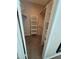Well-organized walk-in closet featuring built-in shelving and ample storage space, perfect for maximizing organization at 1825 W Ray Rd # 2082, Chandler, AZ 85224