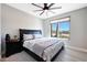 A beautifully designed bedroom with a window and a serene outdoor view at 19745 N Mountain Sage Ln, Surprise, AZ 85374